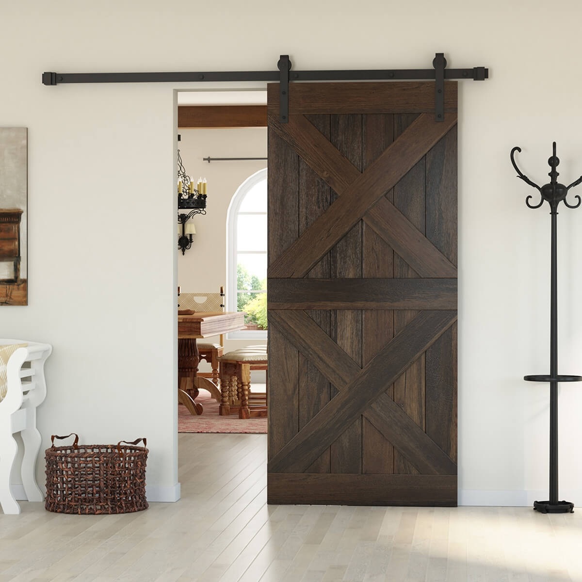 Dark wood sliding barn door with a double X-brace design on black hardware