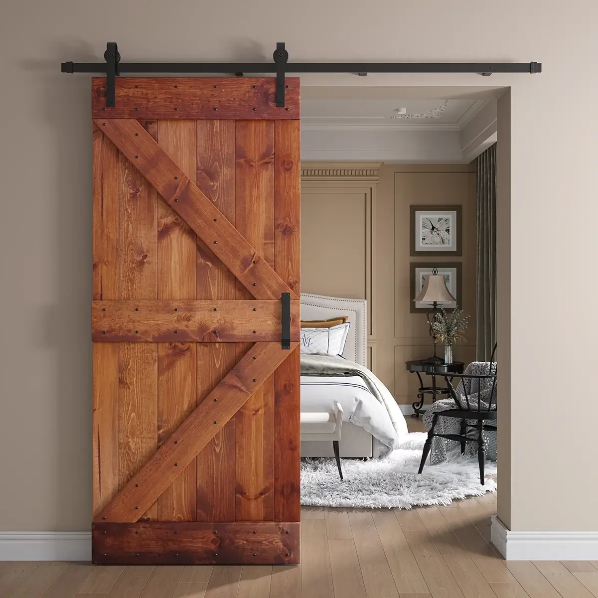 Wood K-brace barn door with dark hardware and rivet details opening to a bedroom