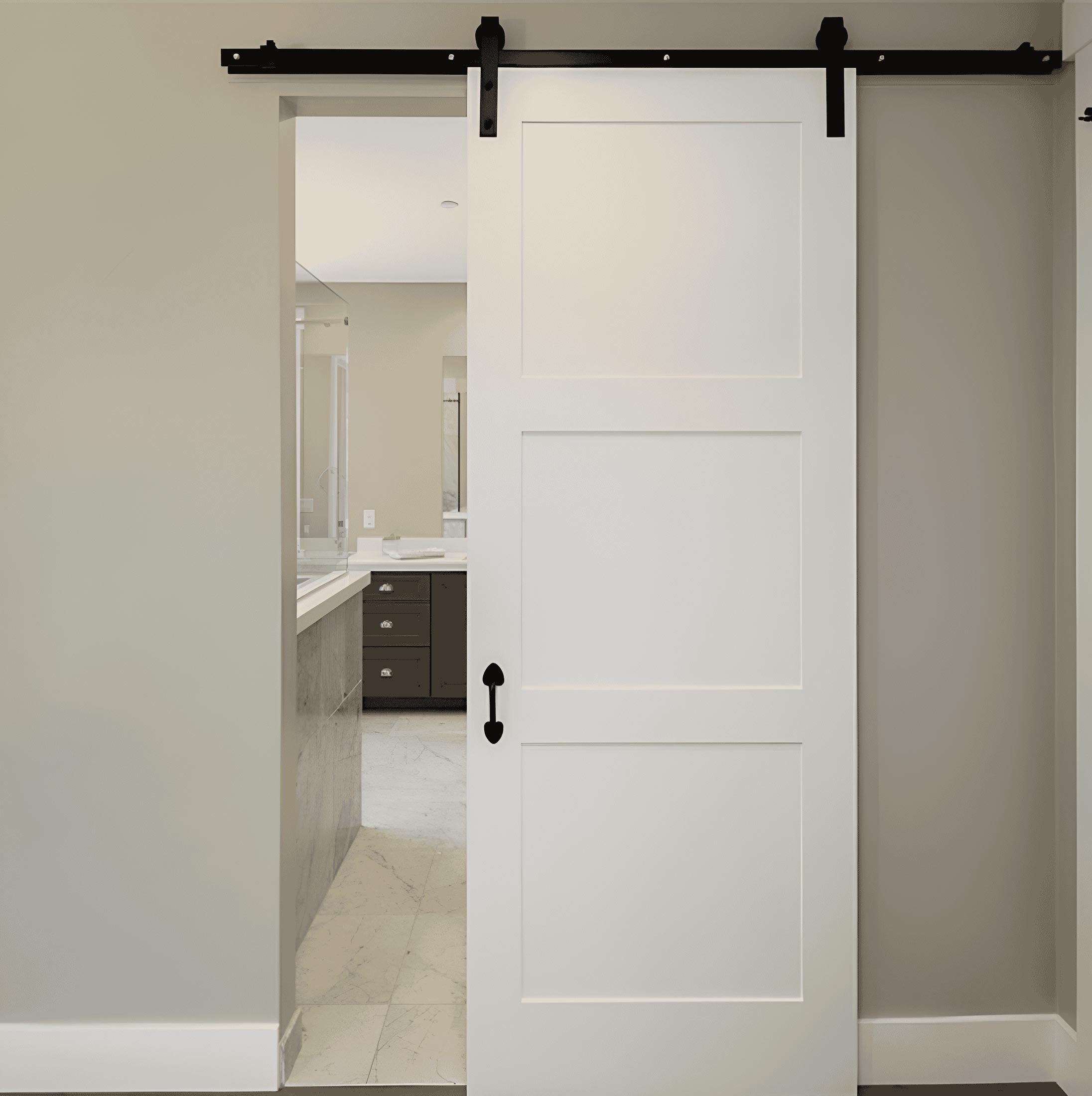 White three-panel sliding barn door with black hardware beside a bathroom