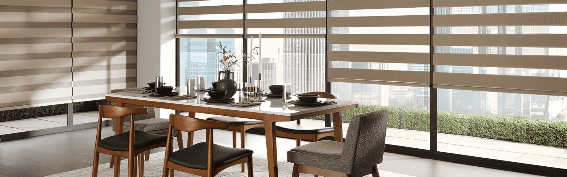 Zebra shades with alternating bands in a modern dining room